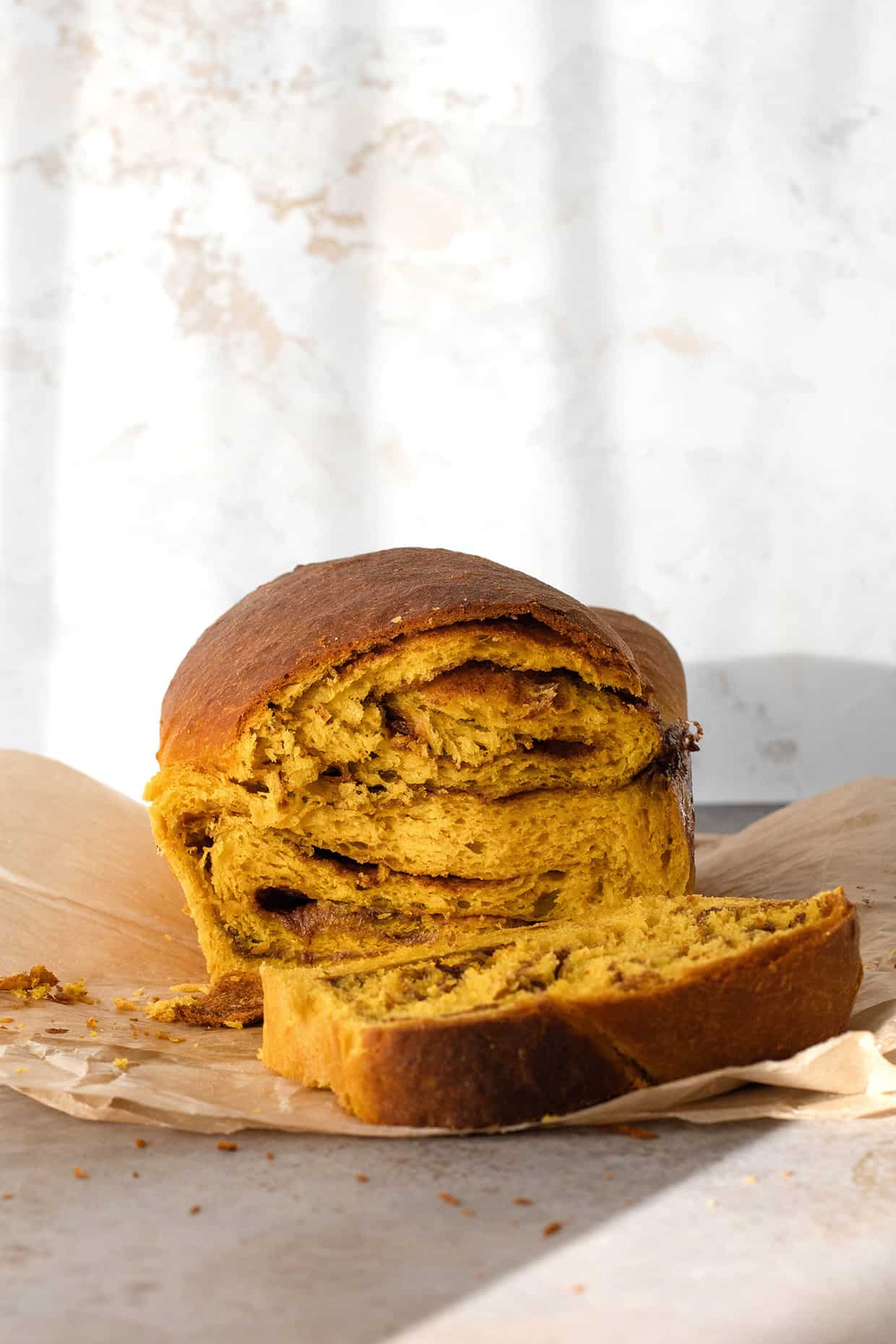 rich cinnamon swirl pumpkin brioche bread, sliced