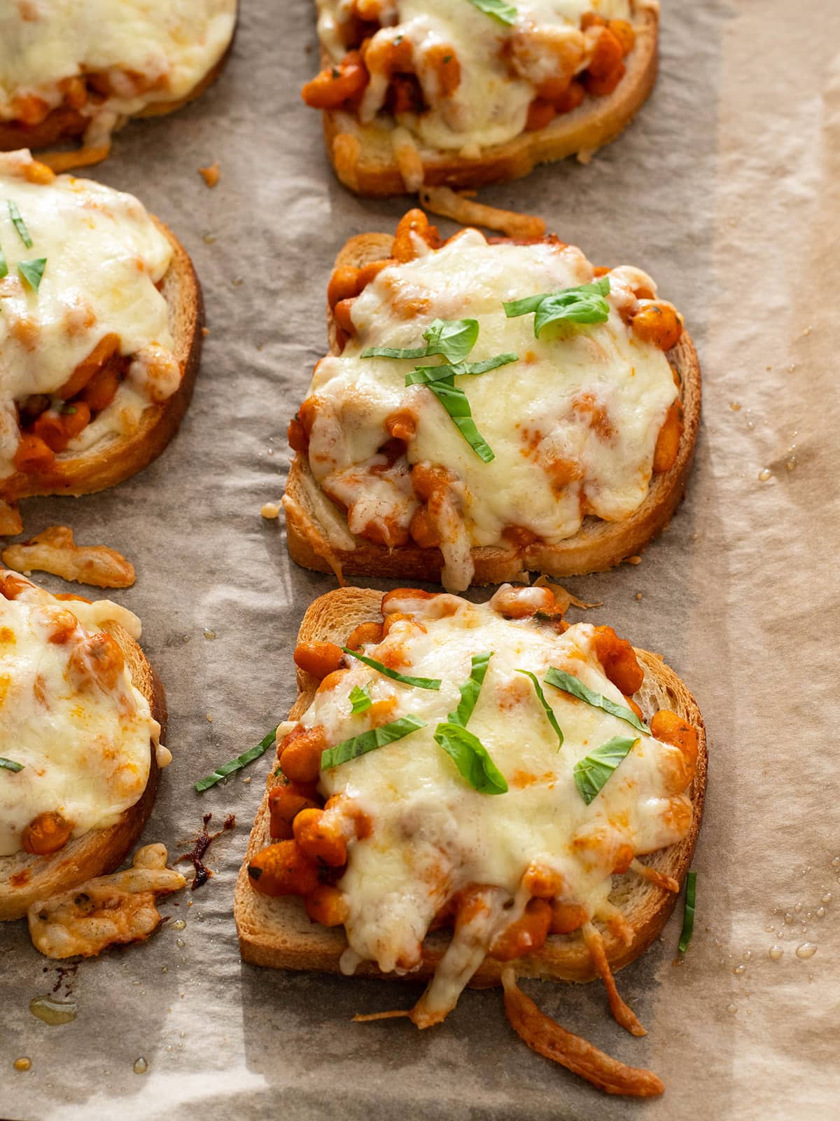 beans on toast covered with cheese and baked