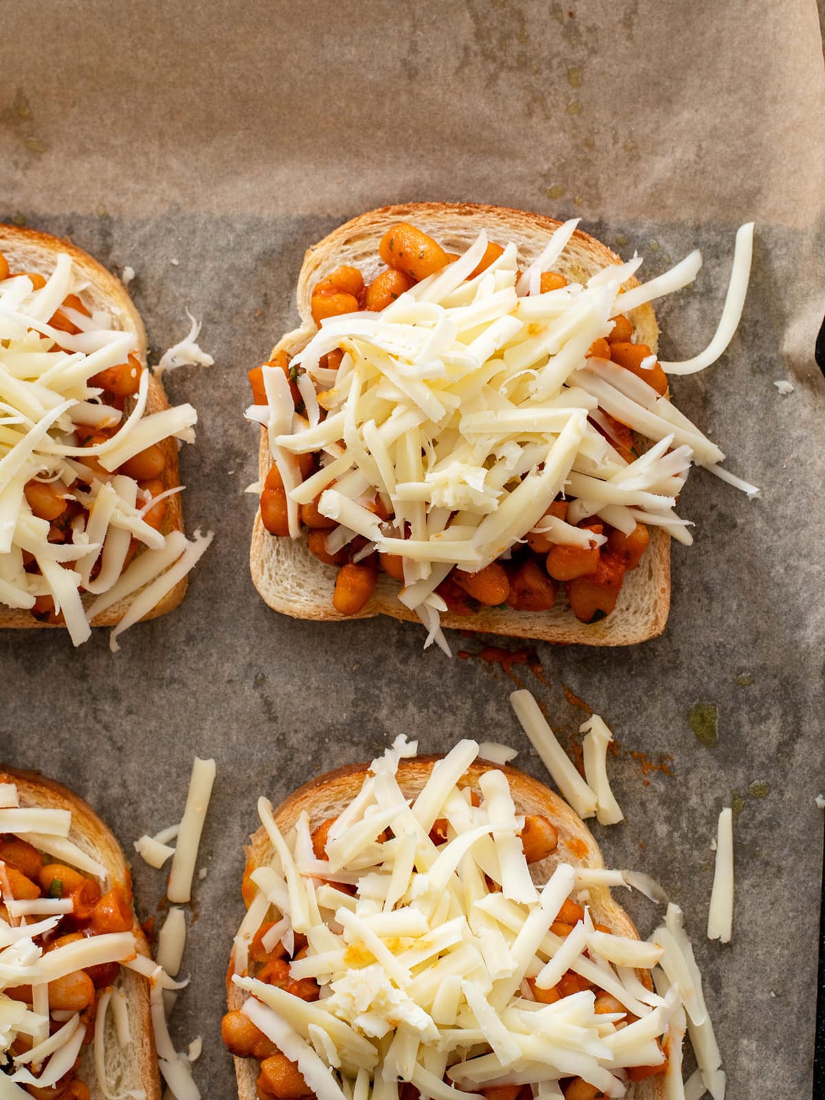 toast with beans and grated cheese