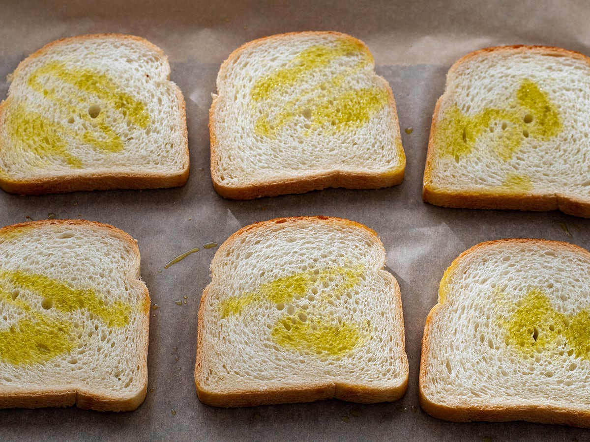 sliced bread drizzled with olive oil