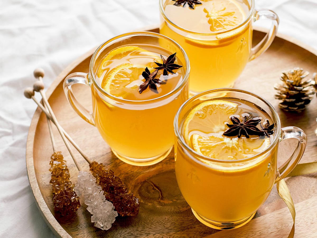 white mulled wine served on wooden tray