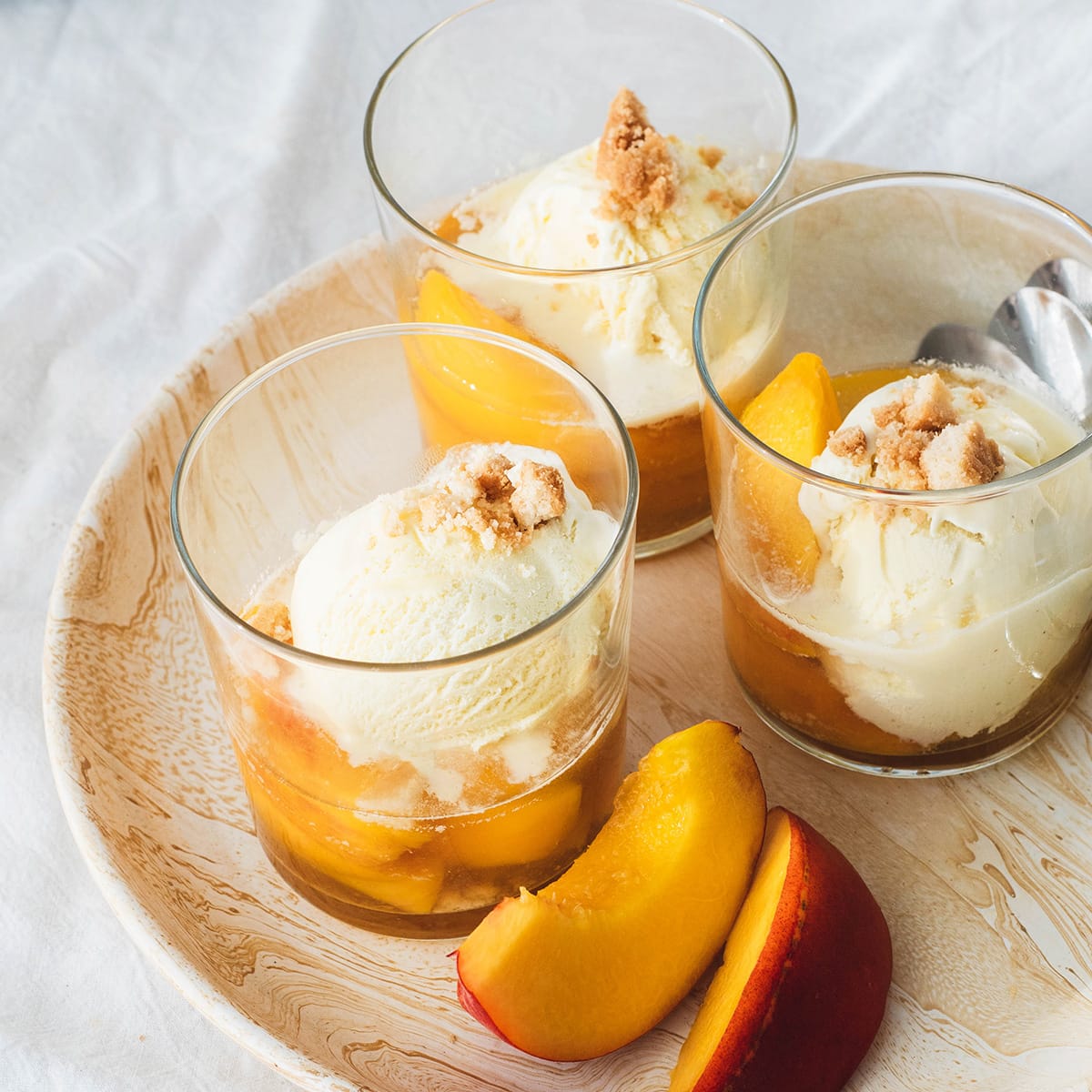 Wine peaches with ice cream