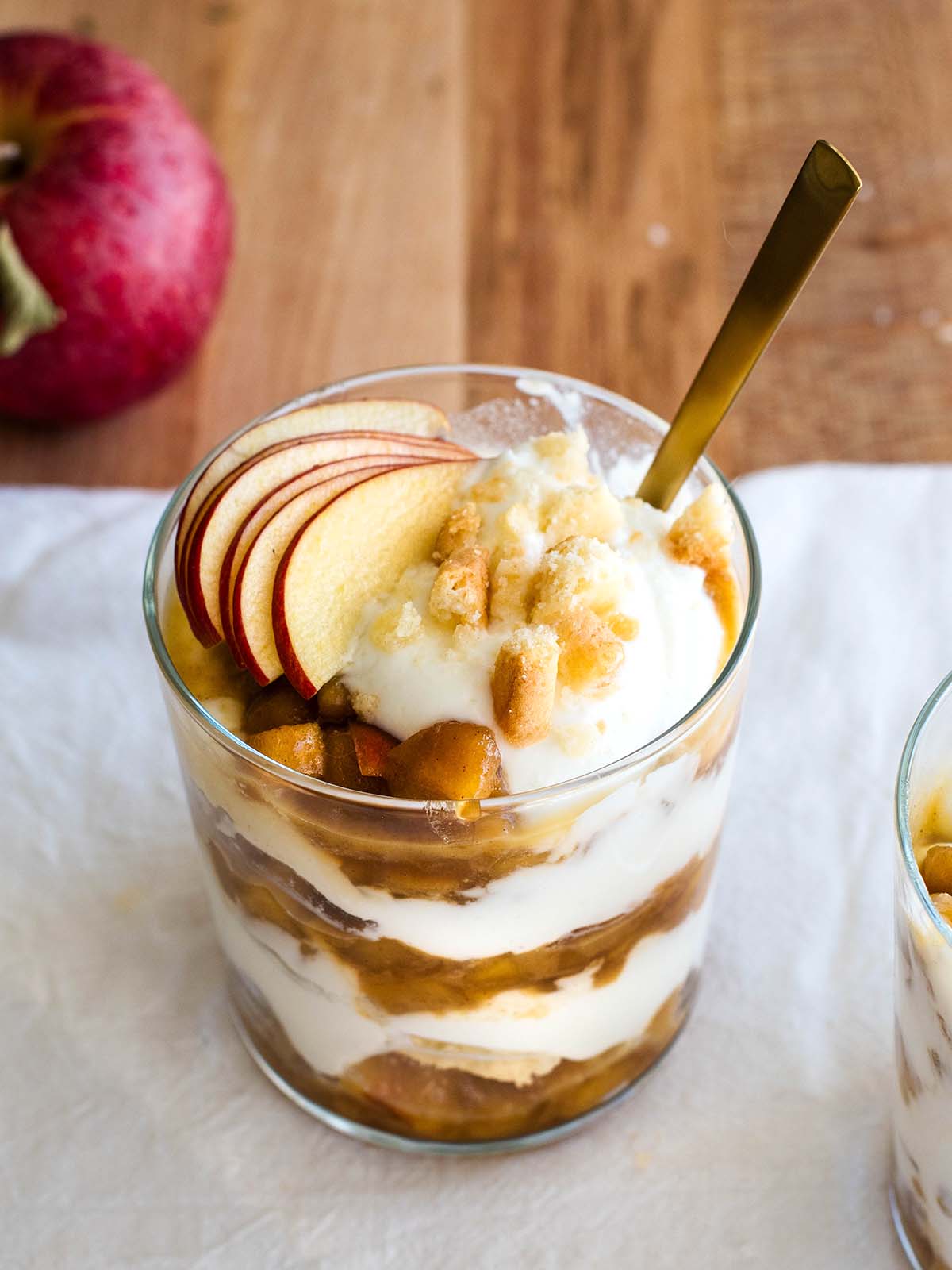 greek yogurt with cinnamon apples layered in a jar