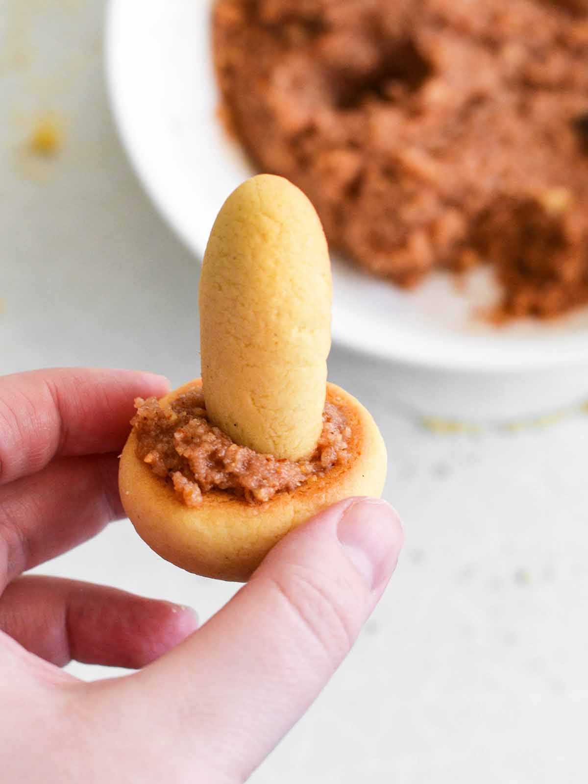 assembling a mushroom shaped cookie
