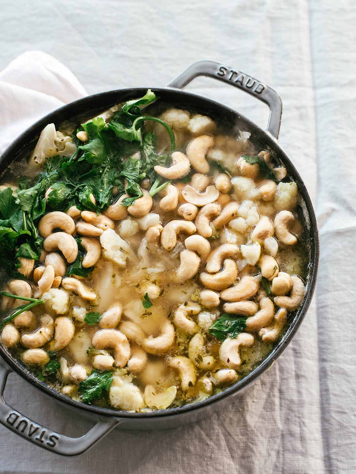 cruciferous vegetables soup with cashews and parsley