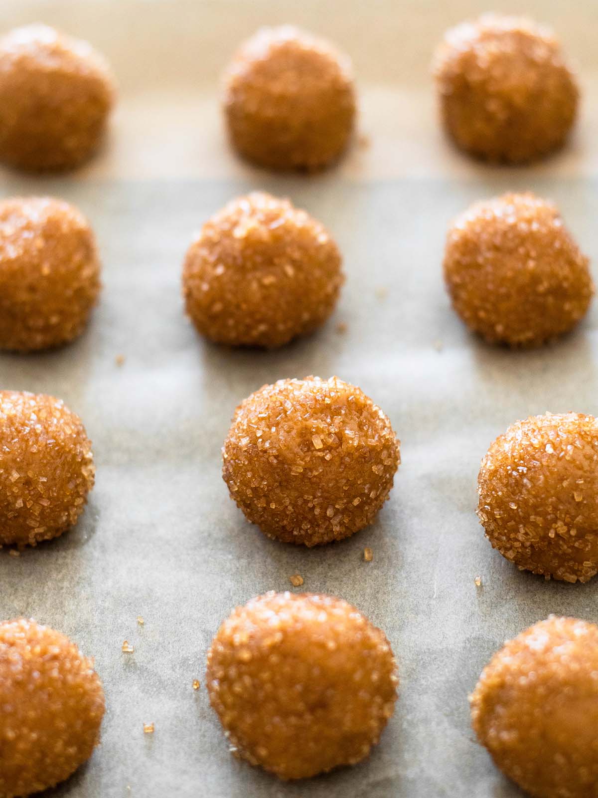 peanut butter cookie balls rolled in sugar