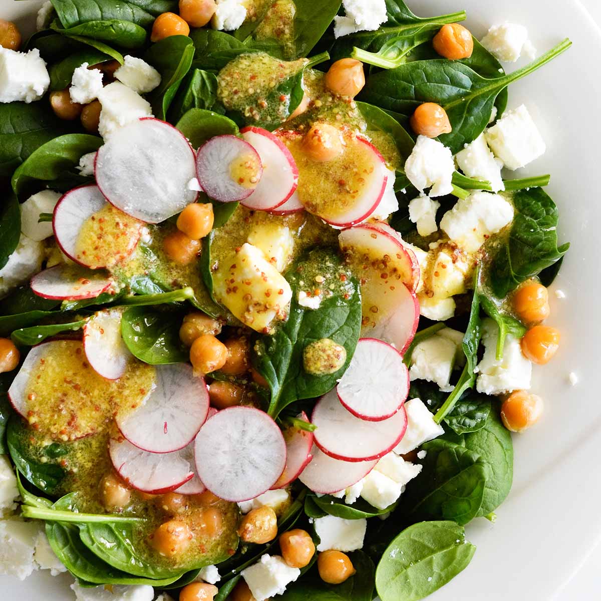 Crispy chickpea spinach salad with a mustard dressing