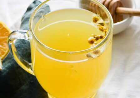 fresh ginger and chamomile tea with honey
