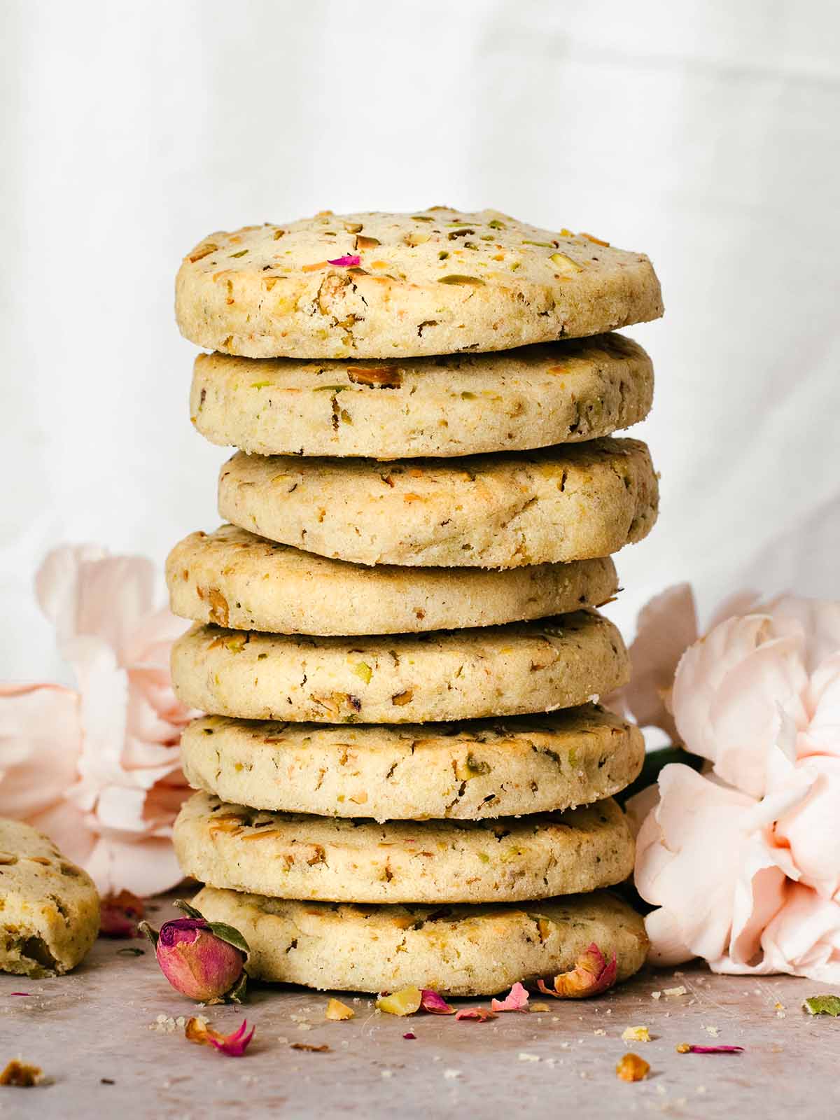 a stack of pistachio shortbread cookies
