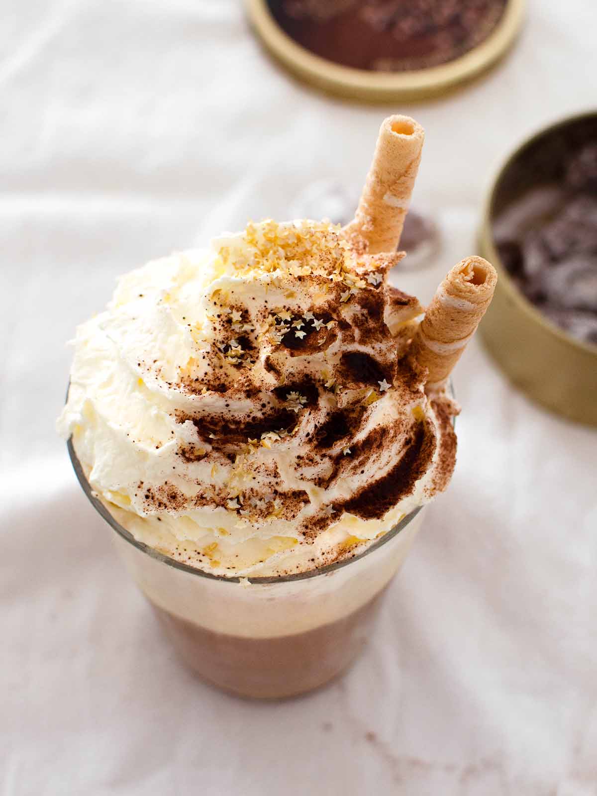 coffee with whipped cream and cocoa
