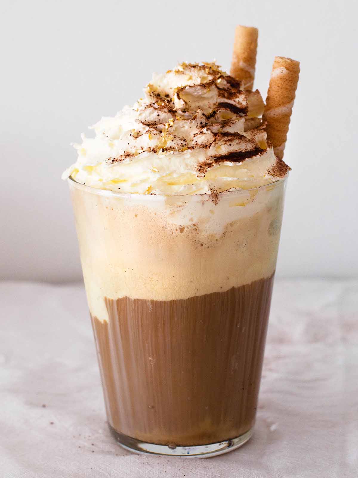 ice cream iced coffee with whipped cream and wafers